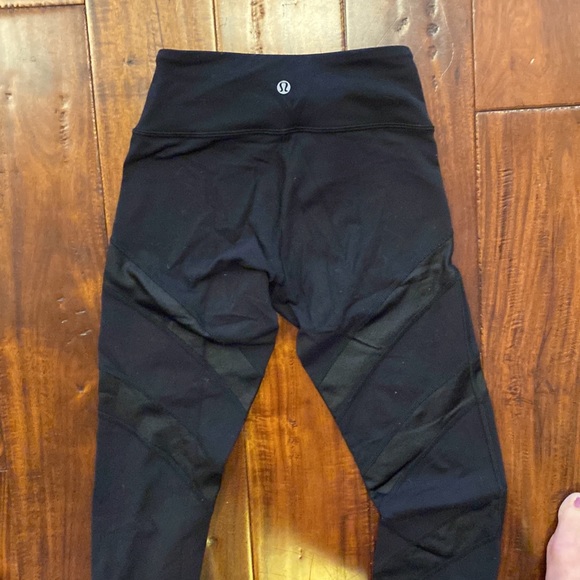 Lululemon black leggings with stirrups and cross stripe design - Picture 3 of 3